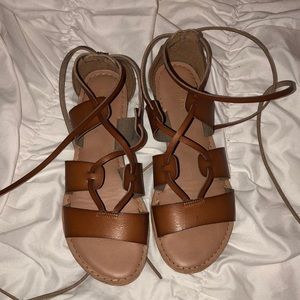 Strapped tie up sandals
